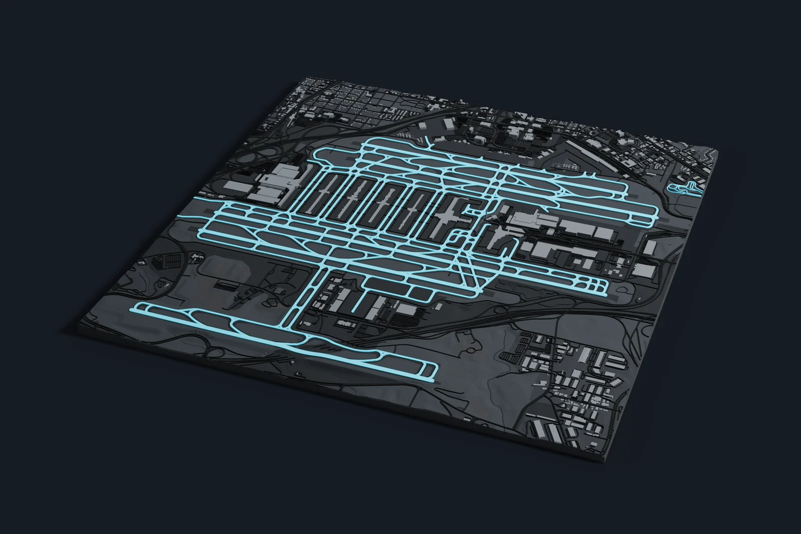 Render of a 3D printed map of Hartsfield–Jackson Atlanta International Airport, the runways and taxiways in cyan on a dark grey model of the terminals, buildings and land around them.