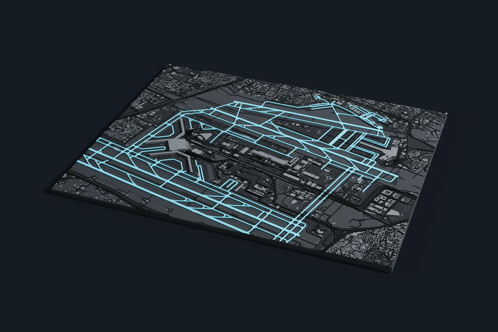 Render of a 3D printed map of Indira Gandhi International Airport, the runways and taxiways in cyan on a dark grey model of the terminals, buildings and land around them.