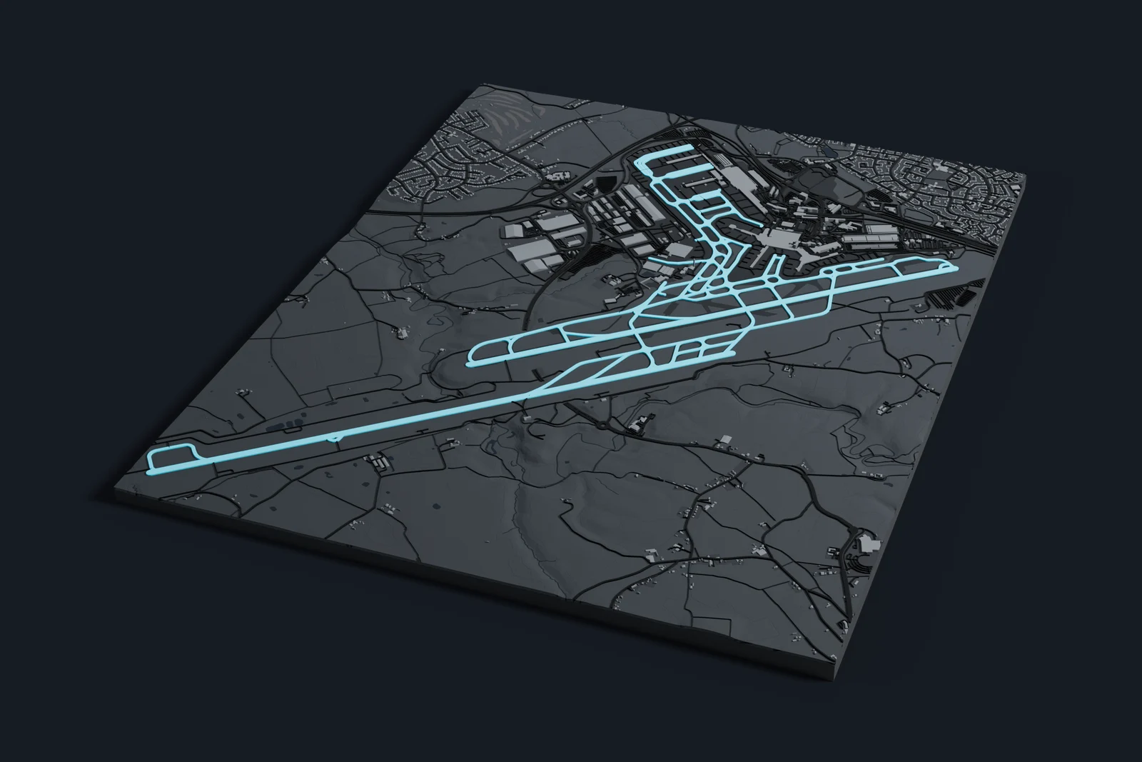Render of a 3D printed map of Manchester Airport, the runways and taxiways in cyan on a dark grey model of the terminals, buildings and land around them.