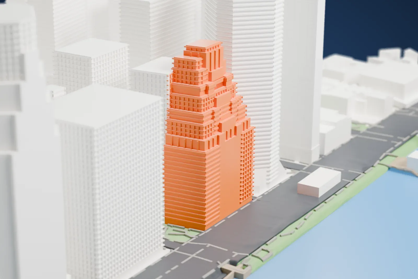 A white 3D print of 120 Wall Street, a tiered tower on the Manhattan waterfront, with water and a strip of park beside the street in front of it.