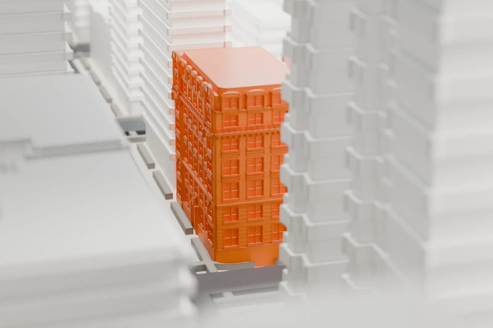 A white 3D print of 1261 Madison Avenue, an ornate corner building with a mansard roof, rising among taller, plainer buildings.