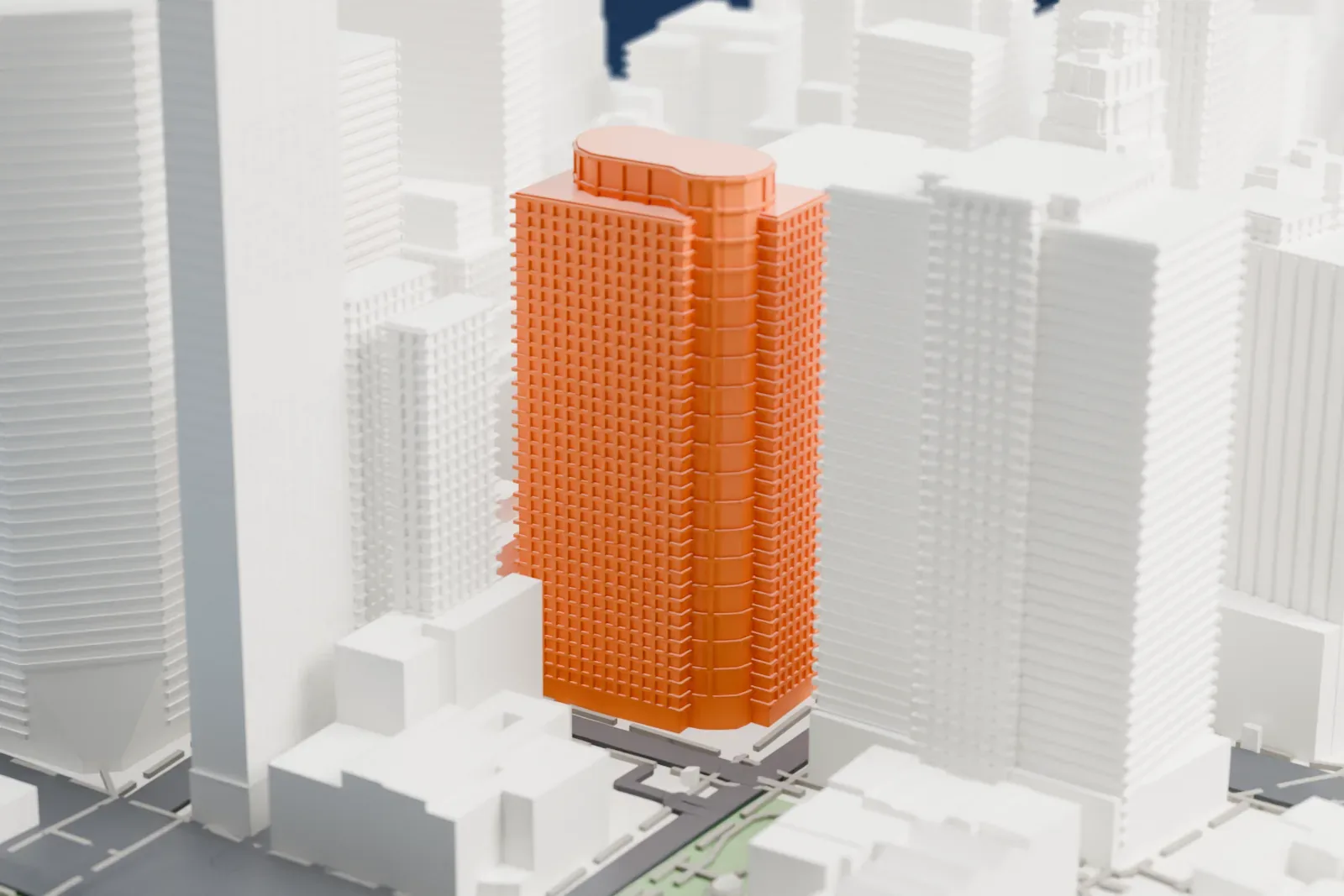 A white 3D print of 175 Water Street, a tower with a rounded top, standing among tall buildings of lower Manhattan.