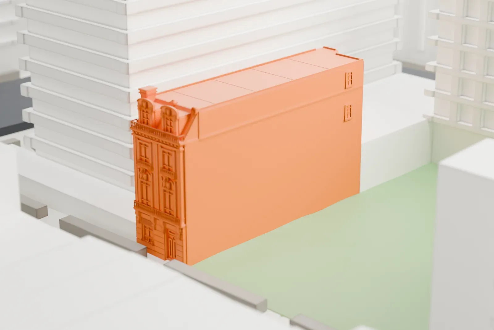 A white 3D print of 207 East 32nd Street, a narrow building in a dense block of much taller buildings.