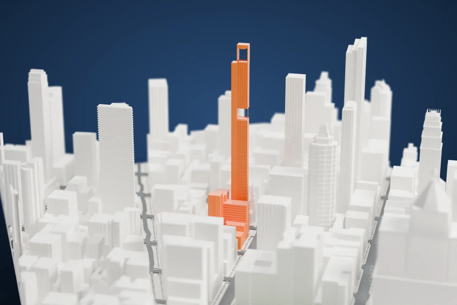 A white 3D print of 262 Fifth Avenue, a very slender skyscraper with an open frame at its top, standing among other high-rise buildings.