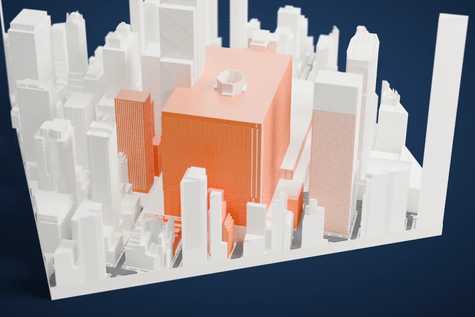 A white 3D print of 277 Park Avenue, a tall rectangular tower with a fine window grid and a flat roof, standing among other skyscrapers in dense Midtown streets.