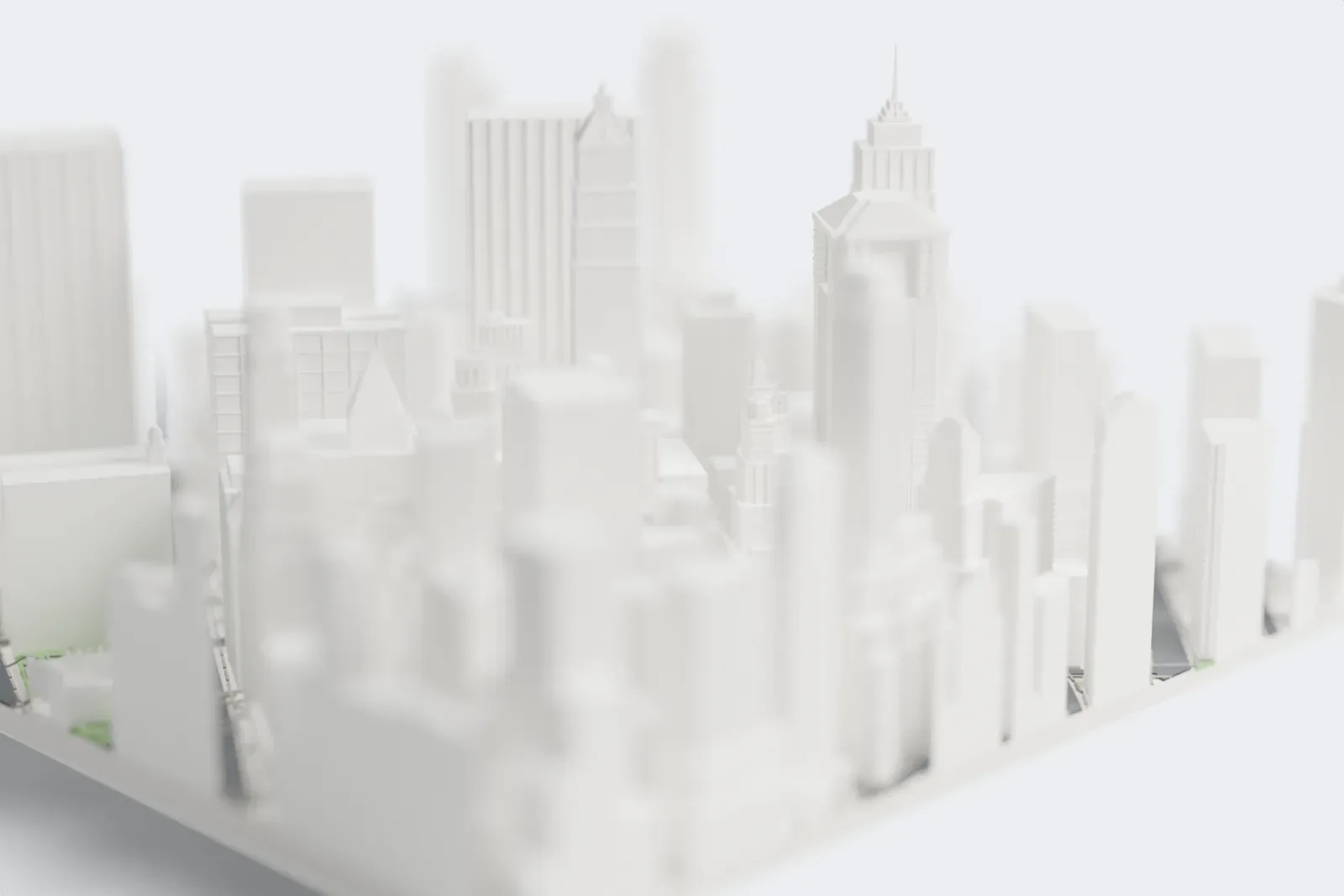 A white 3D print of 28 Liberty Street, a plain rectangular slab tower with fine vertical lines and a flat roof, standing among many other tall buildings in dense city blocks.
