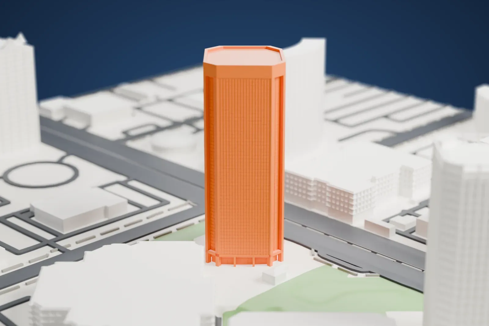 A white 3D print of 3300 North Central Avenue, a tall eight-sided tower with a flat crown, standing beside wide roads and lower buildings.