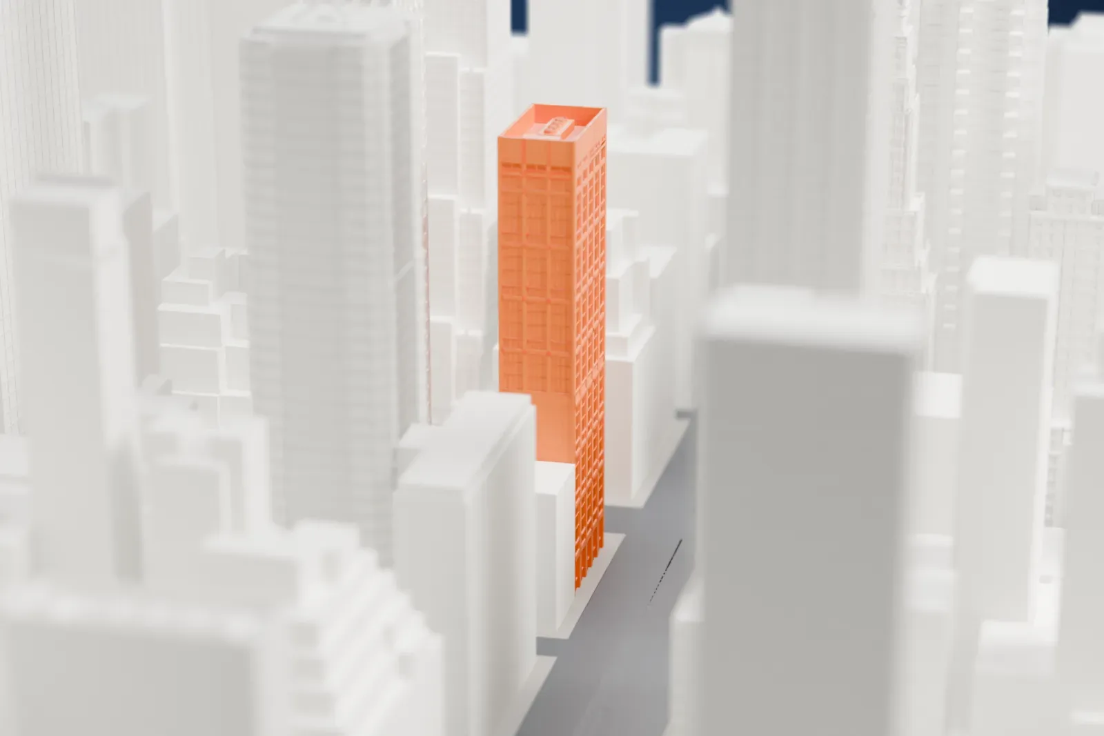 A white 3D print of 450 Park Avenue, a narrow office tower with a flat roof, wedged between taller buildings in a dense block.