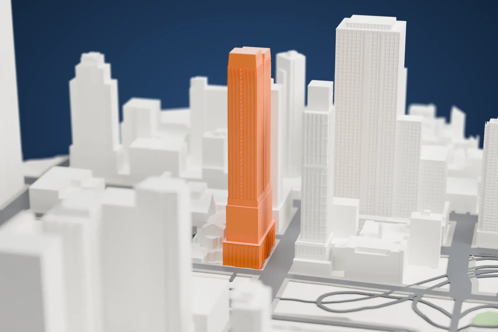 A white 3D print of 555TEN among the surrounding streets and buildings of Midtown West in New York.