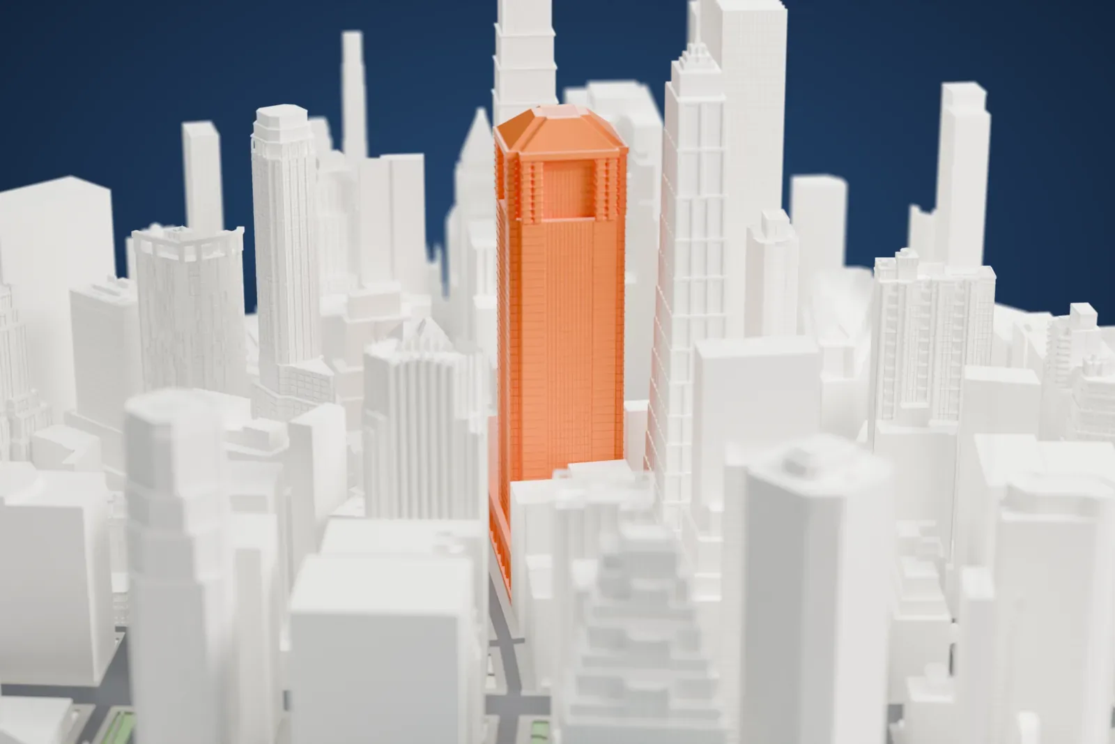 A white 3D print of 60 Wall Street, a tall tower with notched corners and a pyramid-like roof, standing among other skyscrapers.