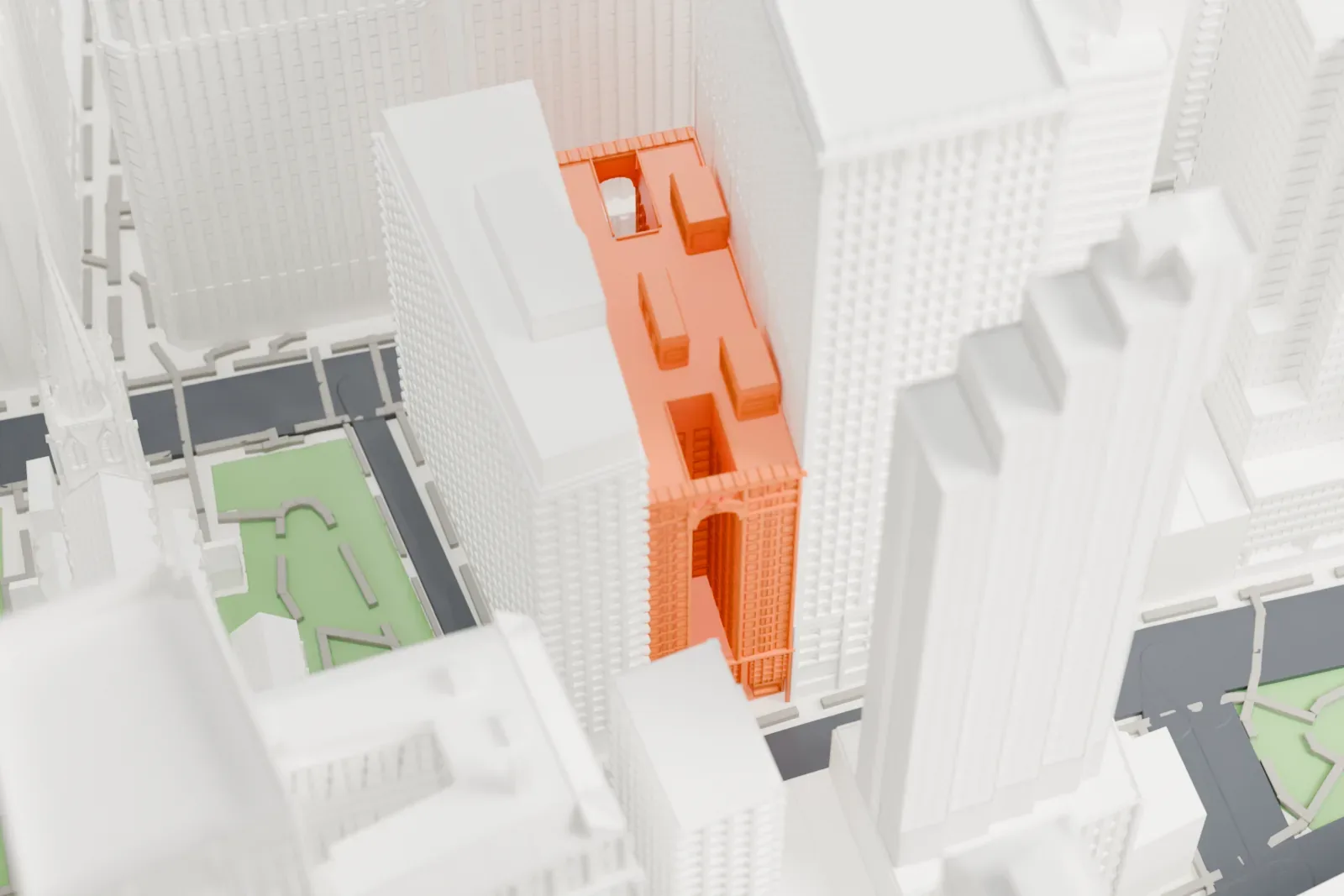 A white 3D print of 65 Broadway, a tall office building almost hidden among neighboring skyscrapers on dense streets.