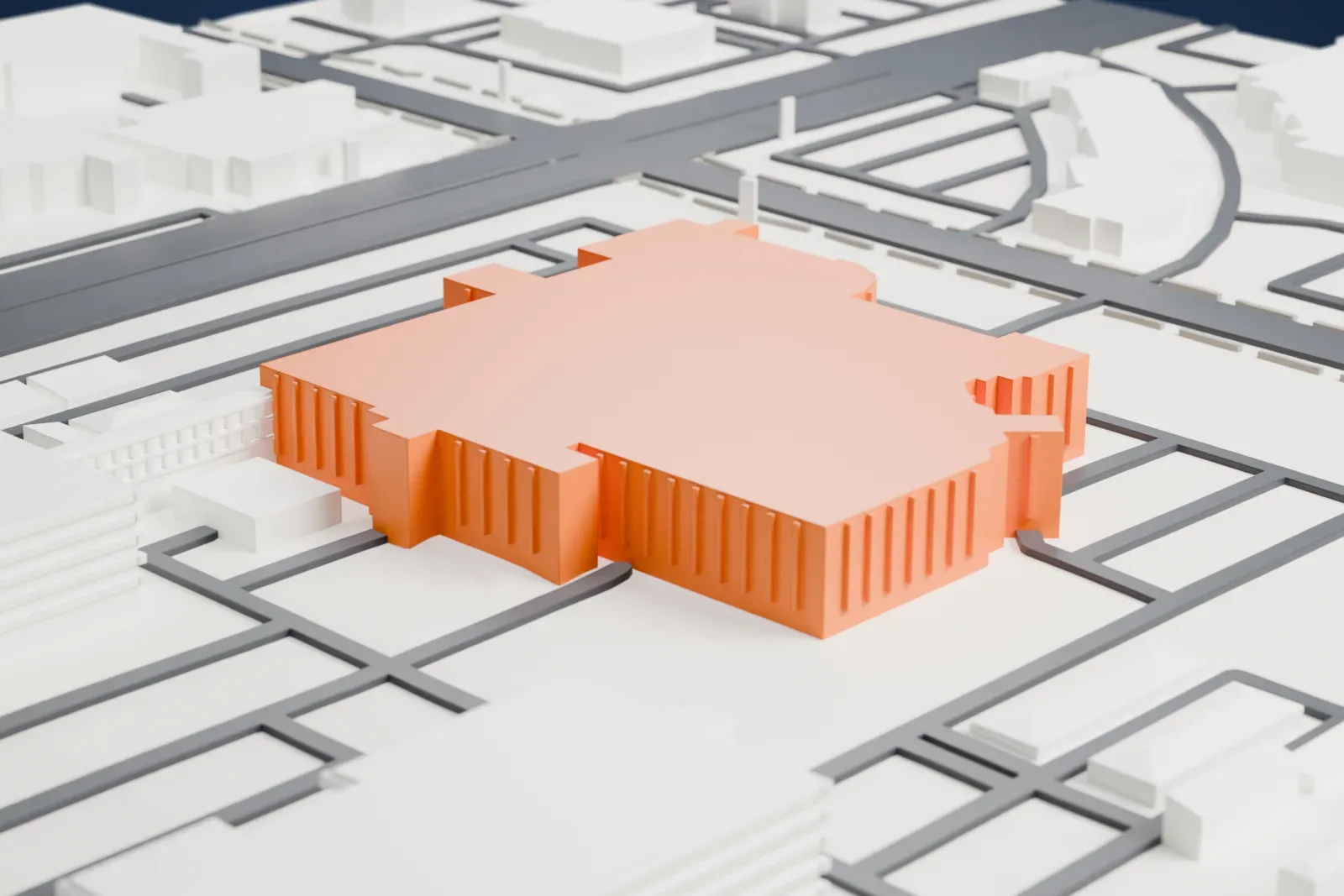 A white 3D print of the Abrazo Scottsdale Campus, a low, sprawling complex of connected blocks with small rooftop units, set among roads and smaller buildings.