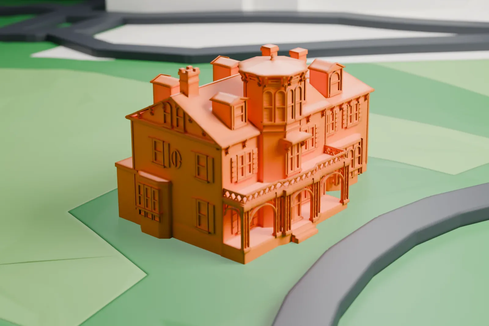 A white 3D print of Acorn Hall with its tower, porches and chimneys, surrounded by streets and buildings.
