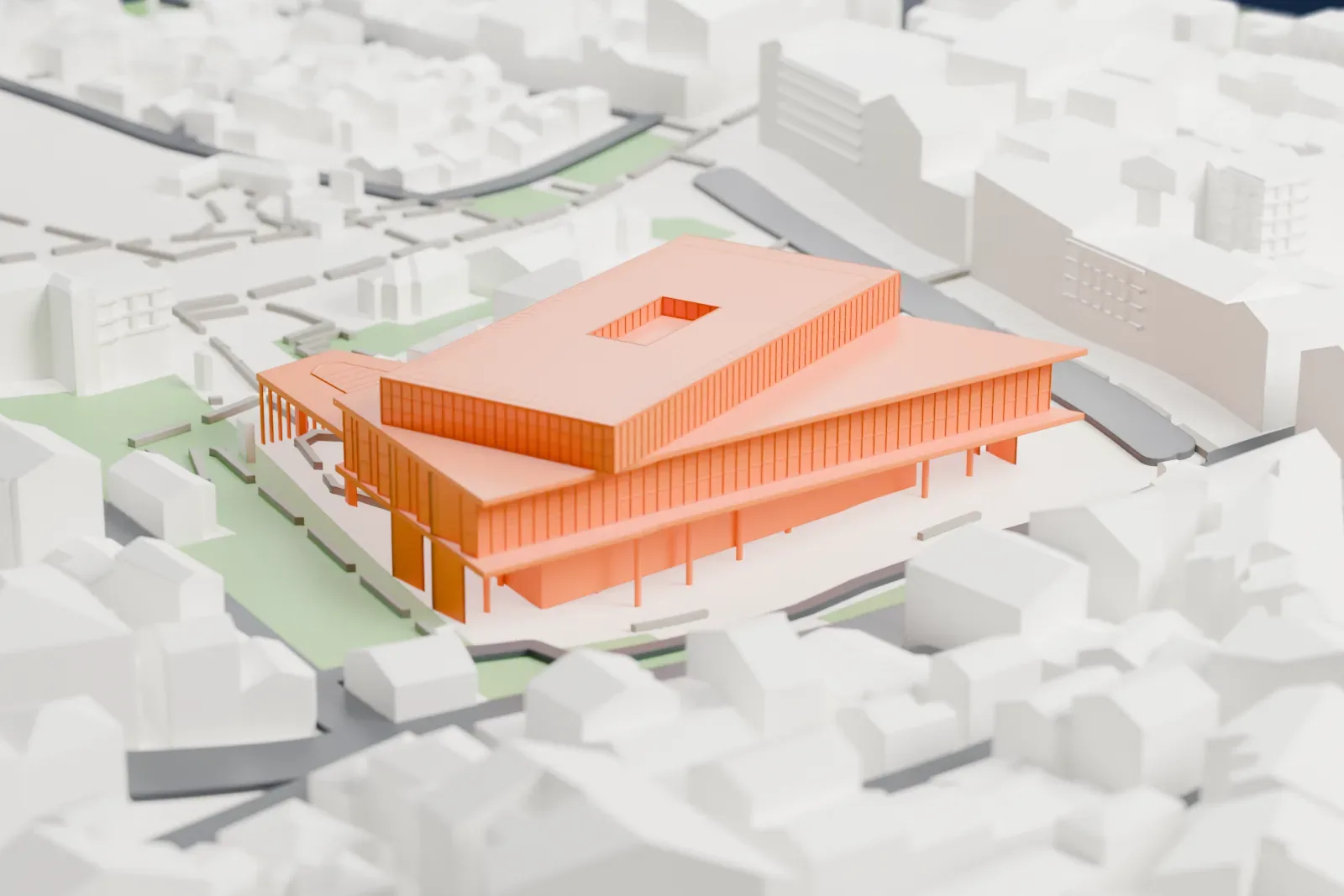 A white 3D print of the Acropolis Museum, a modern building whose upper block sits askew over the lower levels on slender columns, with a rectangular opening in its roof, among low houses and small green patches.