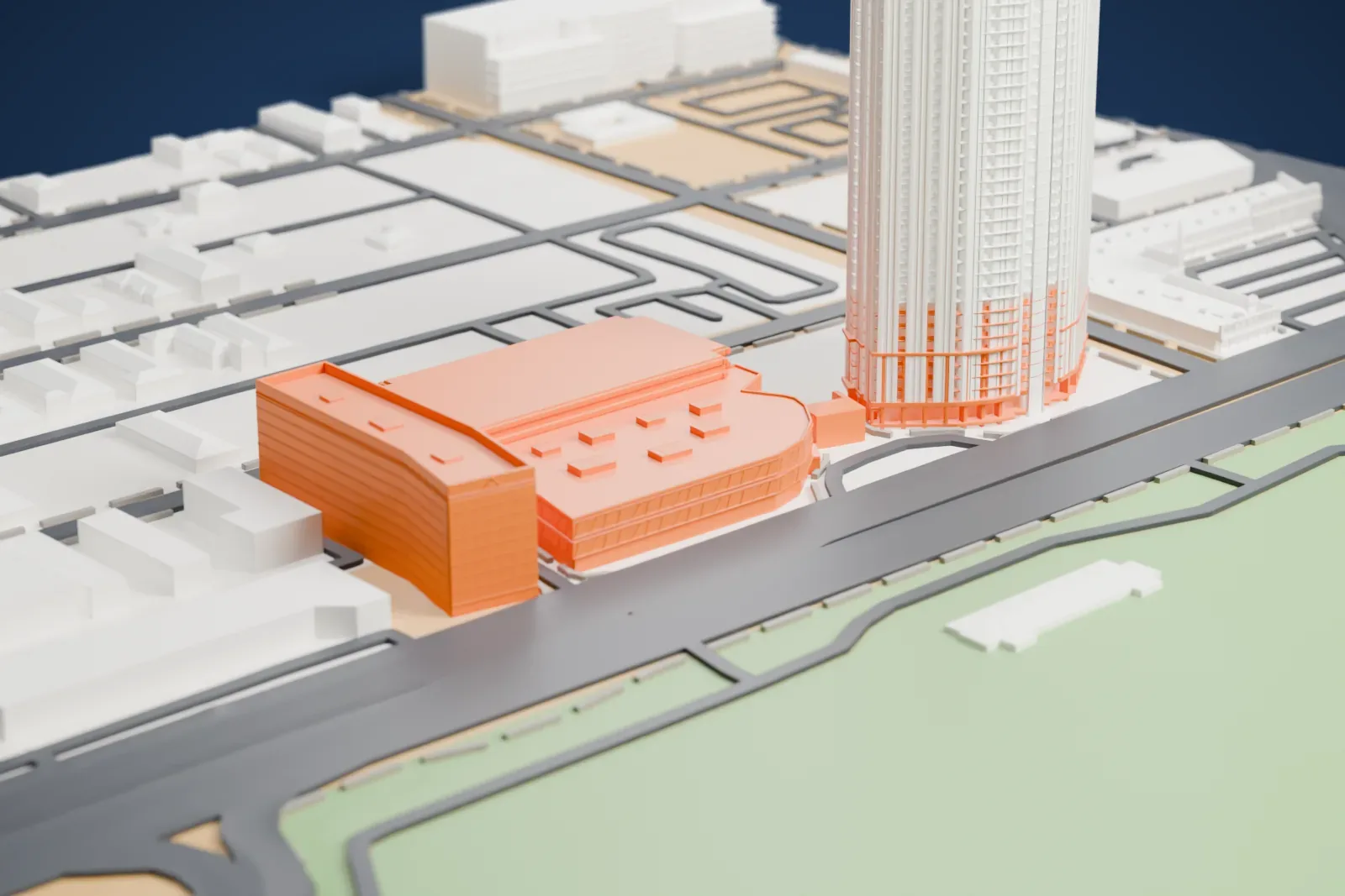 A white 3D print of Ahern Hotel, a hotel block joined by a slim bridge to a wider building with a curved end, beside a tall striped tower and low neighborhood buildings.