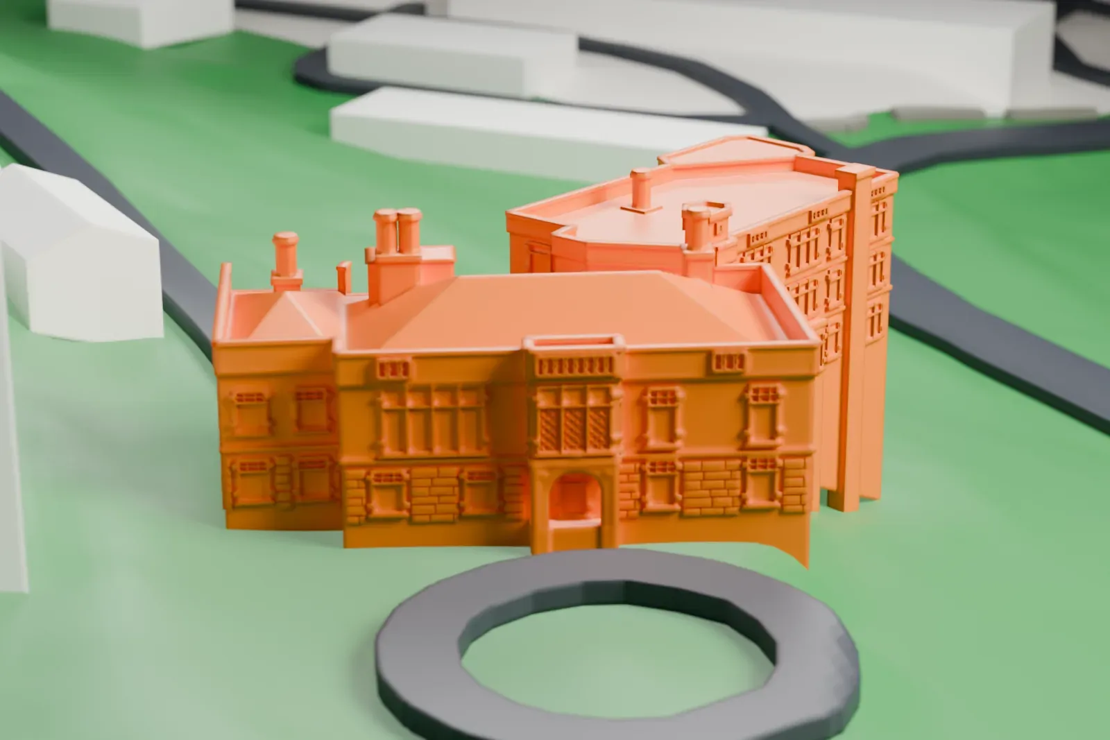 A white 3D print of Ailsa Farms, a multi-wing house with many chimneys, on green lawns with curved paths and a few nearby buildings.
