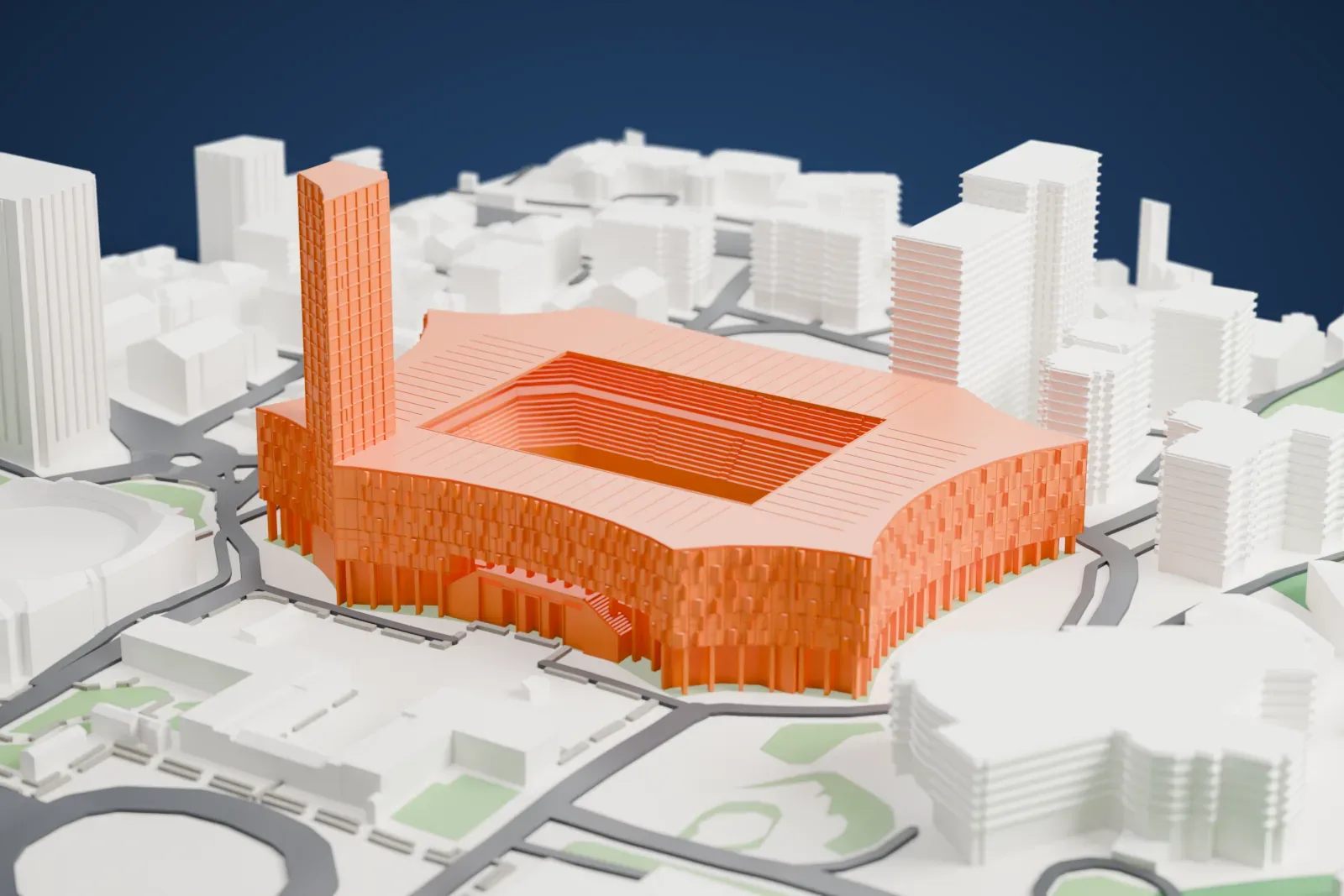 A white 3D print of the Air Albania Stadium with an open seating bowl and a corner tower, surrounded by streets, buildings, and green spaces.