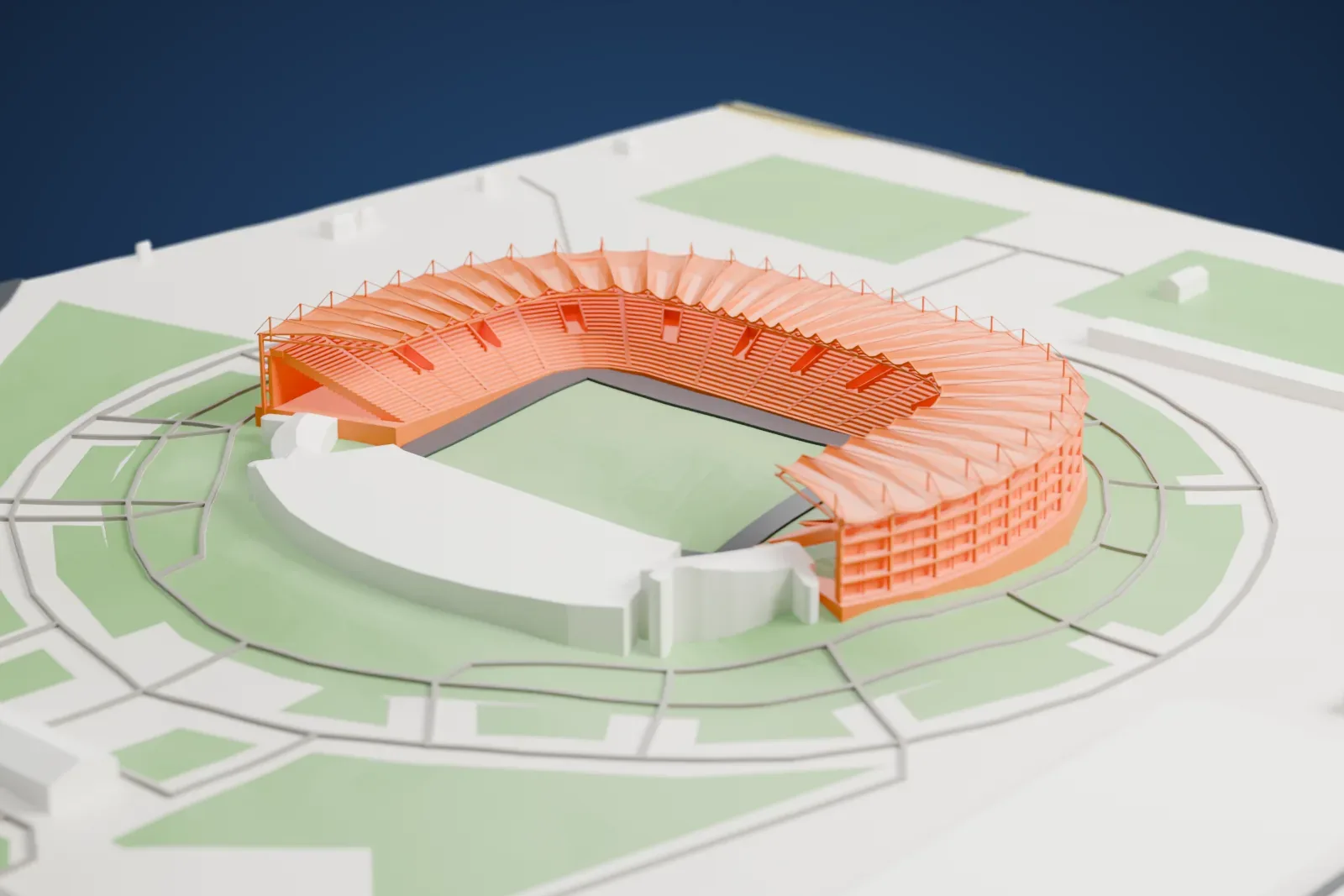 A white 3D print of the Akhmat-Arena, an open U-shaped stadium stand with a ribbed roof, surrounded by green ground and city buildings.