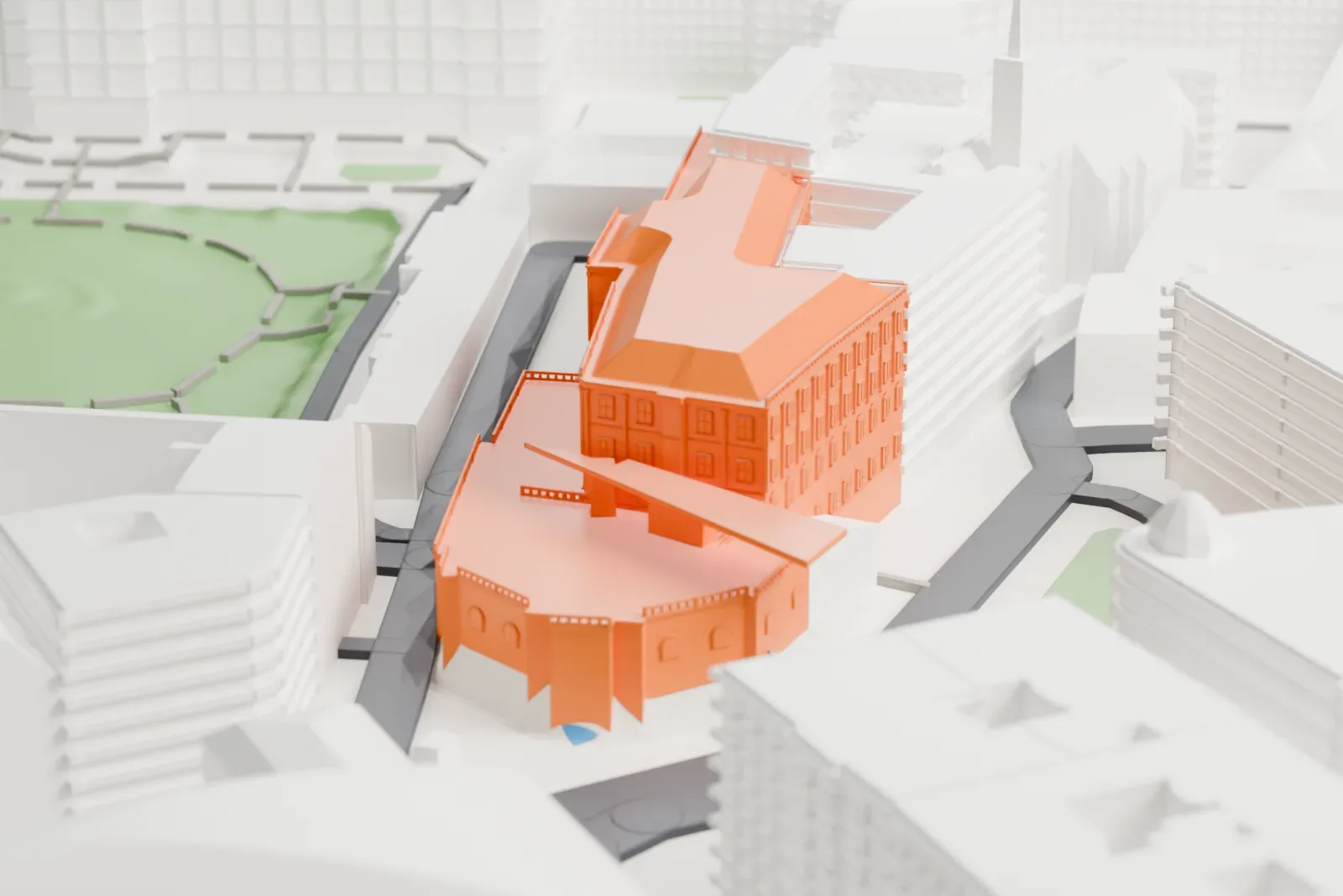 A white 3D print of the Albertina, a long, low building with rows of windows and a thin projecting roof, beside a green park and surrounded by city buildings.