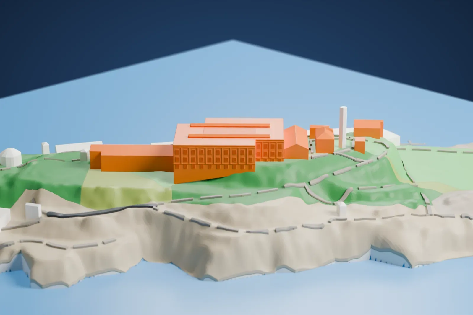 A white 3D print of the main building on Alcatraz Island, a large block with rows of narrow windows and two raised roof ridges, standing on a green hillside above the bay.