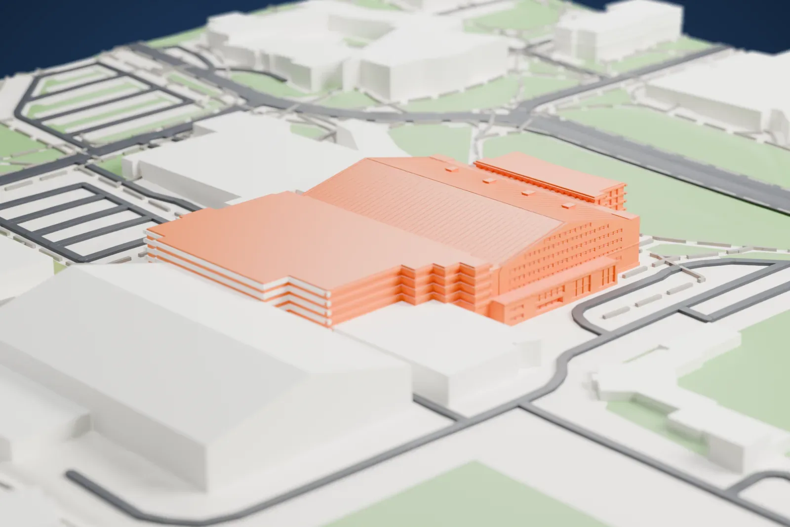 A white 3D print of Allen Fieldhouse, a long building with a broad ridged roof, tucked in among neighboring buildings, roads and green spaces.