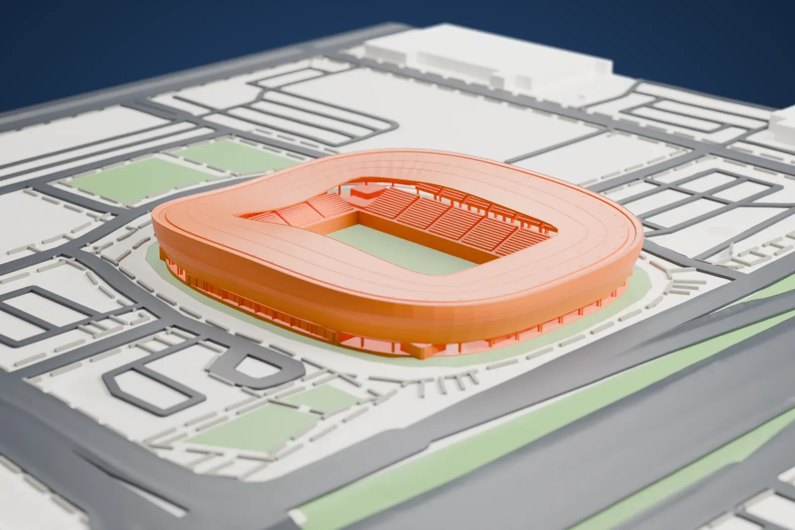 A white 3D print of Allianz Field, a ring-shaped stadium with a sweeping oval roof and an open center, surrounded by streets, green patches and a wide highway.