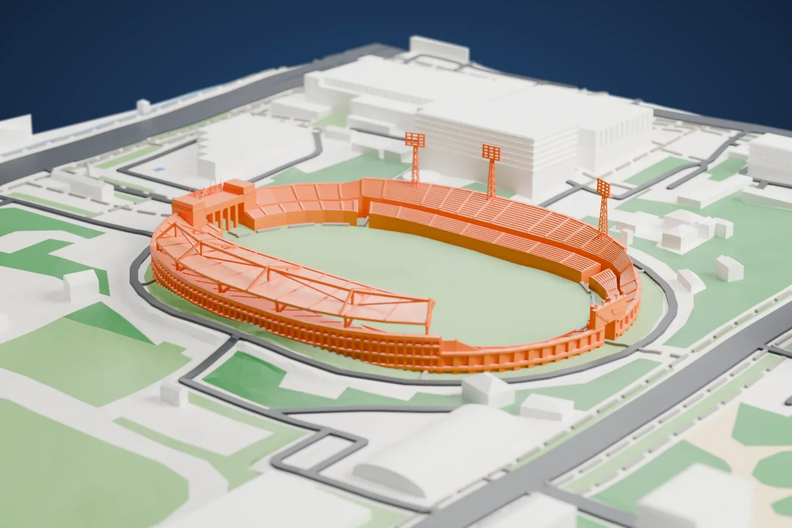 A white 3D print of Almaty Central Stadium, an open oval bowl inside a ring building with gated ends and floodlight masts, among streets and buildings.