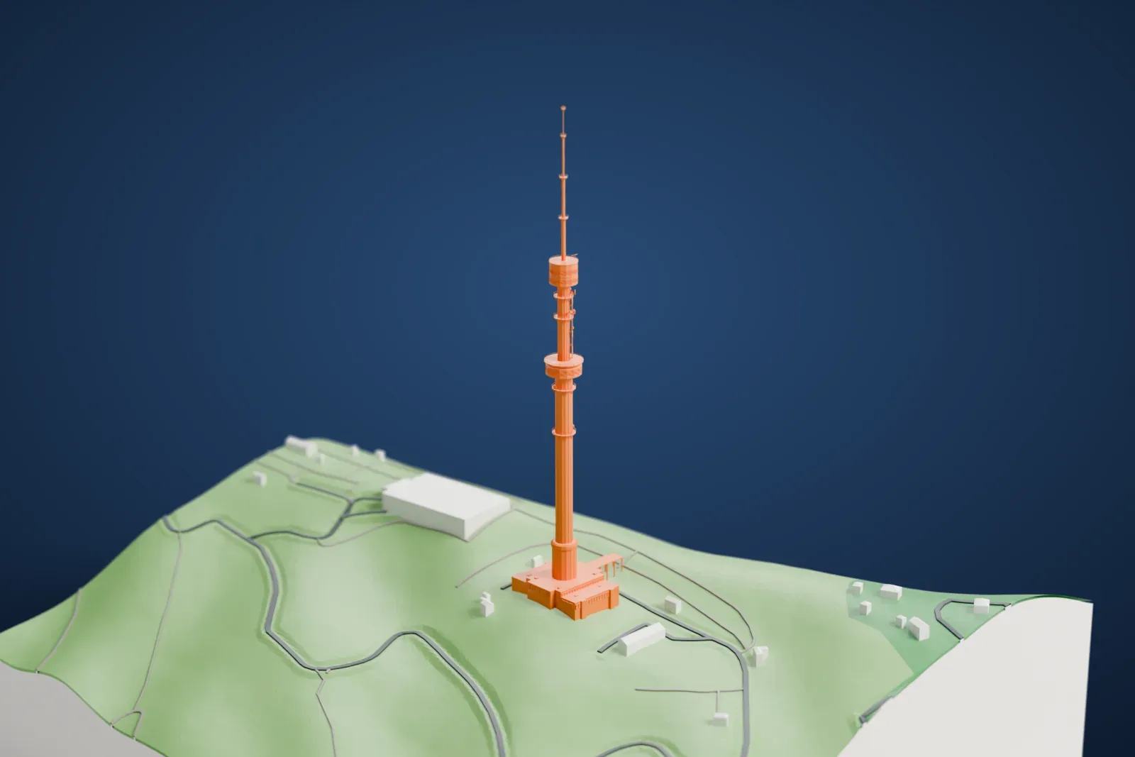 A white 3D print of Almaty Tower, a very tall slender tower with two round observation decks and a thin antenna, standing on a hillside with winding roads and a few buildings.