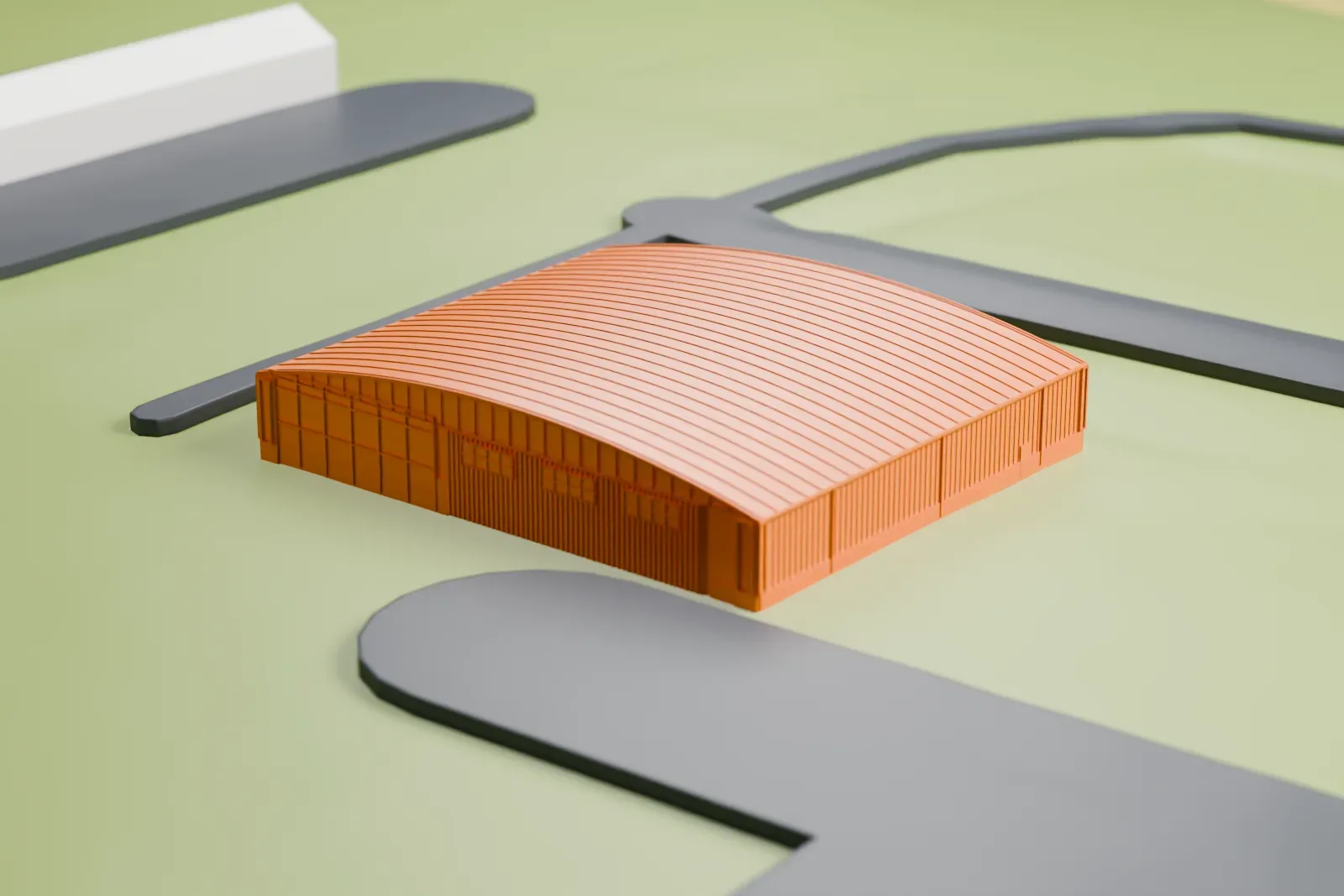 A white 3D print of the Amelia Earhart Hangar Museum, a long, low hangar with a ribbed arched roof, standing alone on open grass between paved paths.