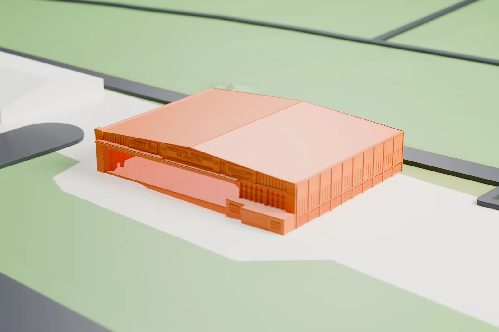 A white 3D print of the American Airpower Museum hangars, a large hangar building with a low gabled roof on open grounds with a road beside it.