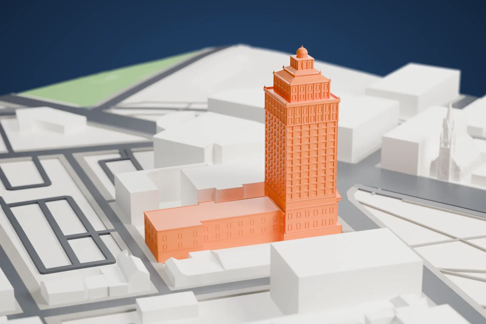 A white 3D print of the American Insurance Company Building, a neo-classical tower with a columned entrance and stepped crown, among the surrounding streets and buildings of Newark.