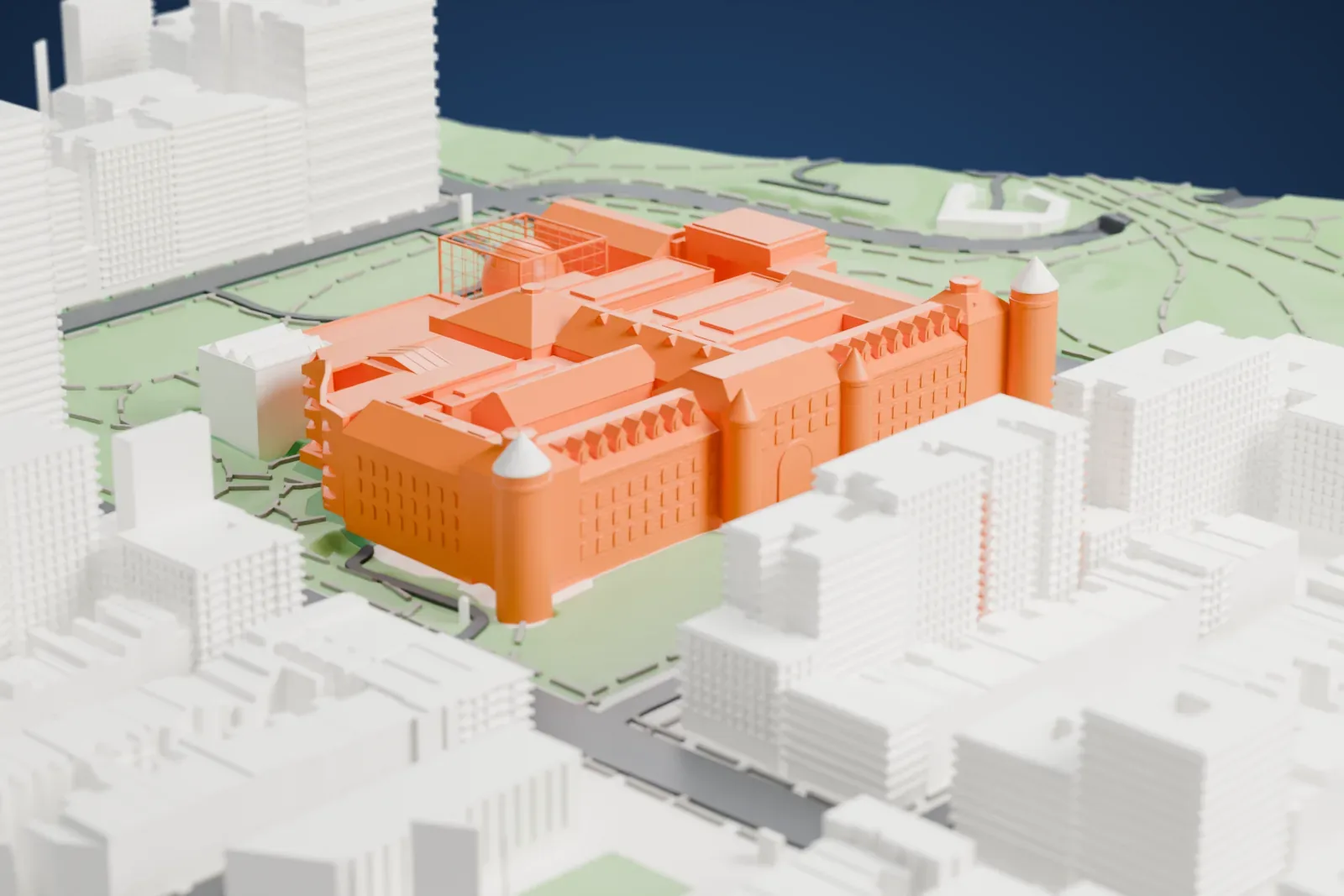 A white 3D print of the American Museum of Natural History, a wide group of connected buildings with round towers and a lattice cube, set in a green park among tall city buildings.
