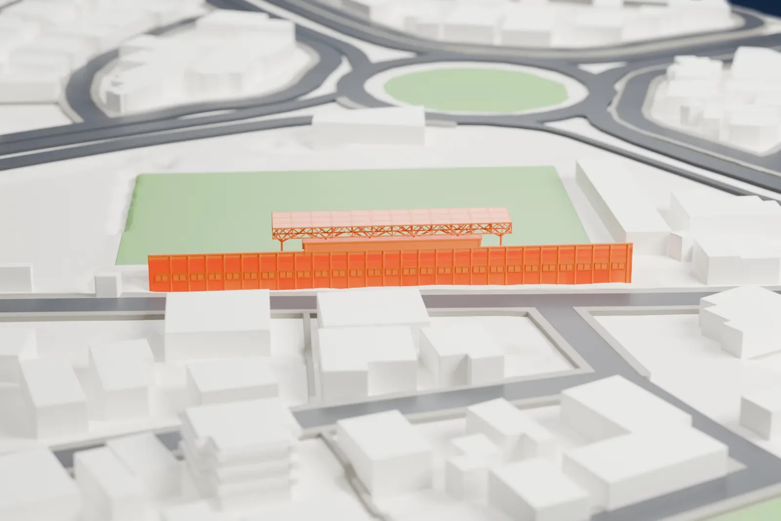A white 3D print of Ammochostos Epistrofi Stadium, a long stepped grandstand with a canopy over its center, beside a green pitch and surrounded by streets and low buildings.