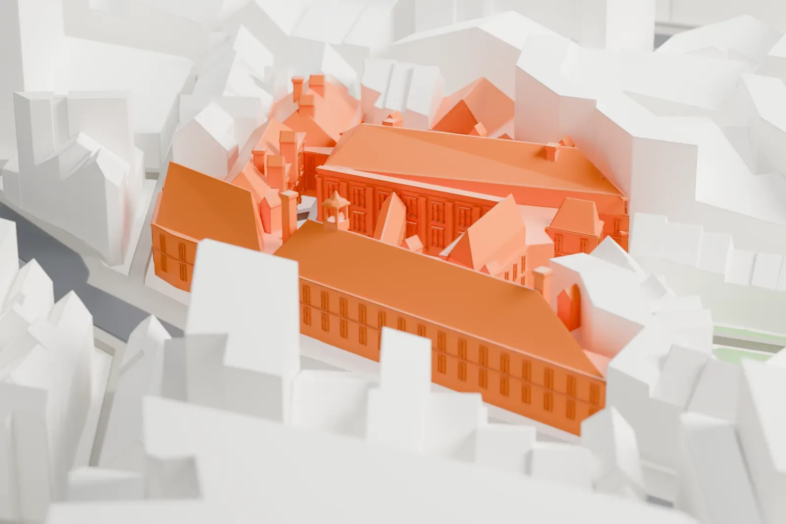 A white 3D print of the Amsterdam Museum, a broad building among the surrounding streets and buildings of Amsterdam.