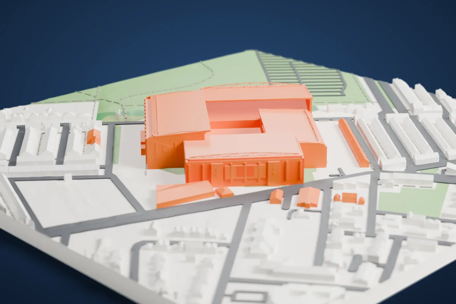 A white 3D print of Anfield, a compact football stadium with four roofed stands, surrounded by rows of terraced houses, small streets and an open park.