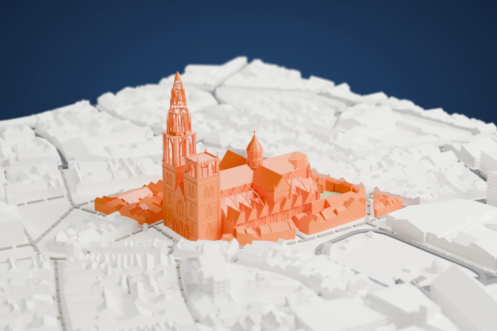 A white 3D print of Antwerp Cathedral, a Gothic church with one tall openwork spire, standing among dense, steep-roofed buildings.