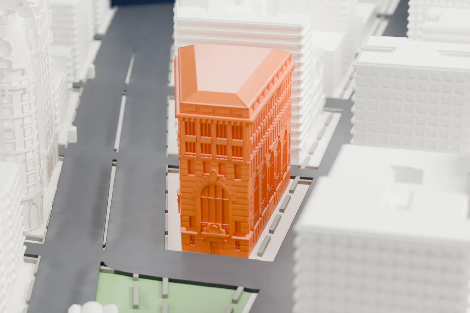 A white 3D print of the Apple Bank Building, a large block with tall arched windows and a broad hipped roof, standing between streets and a small green park among neighboring buildings.