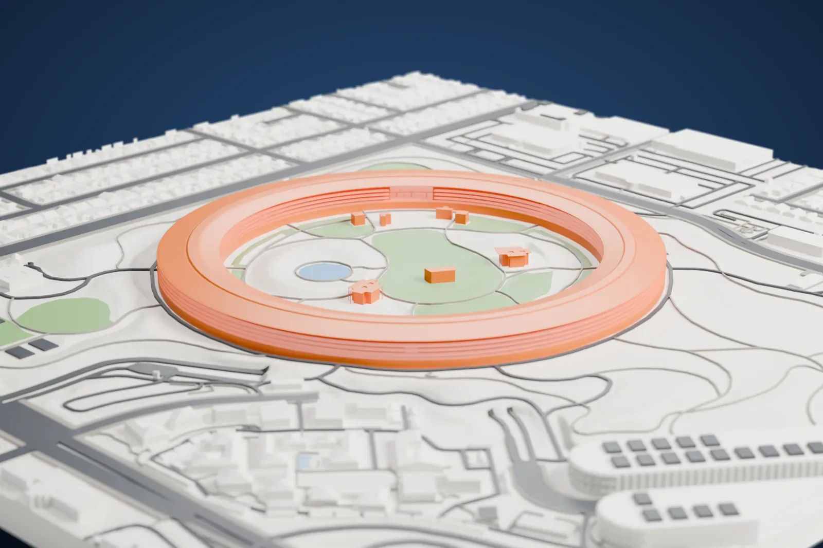 A white 3D print of Apple Park, a low circular ring of offices around an open courtyard, among surrounding streets and buildings.