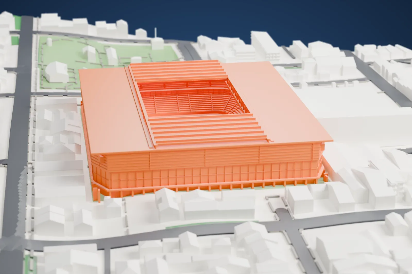 A white 3D print of Arena da Baixada, a box-shaped stadium under a flat roof with an opening over the pitch, among city streets and buildings.