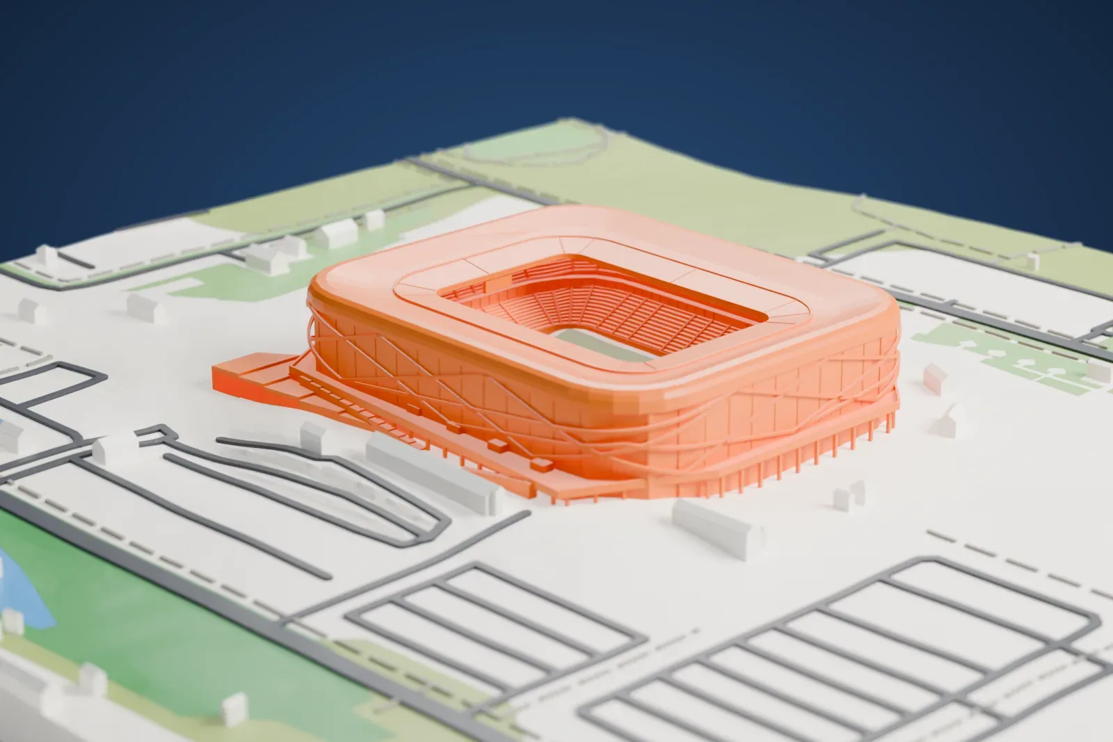 A white 3D print of Arena Lviv, a closed stadium with a rounded roof edge over its facade, on a raised podium among city streets and buildings.