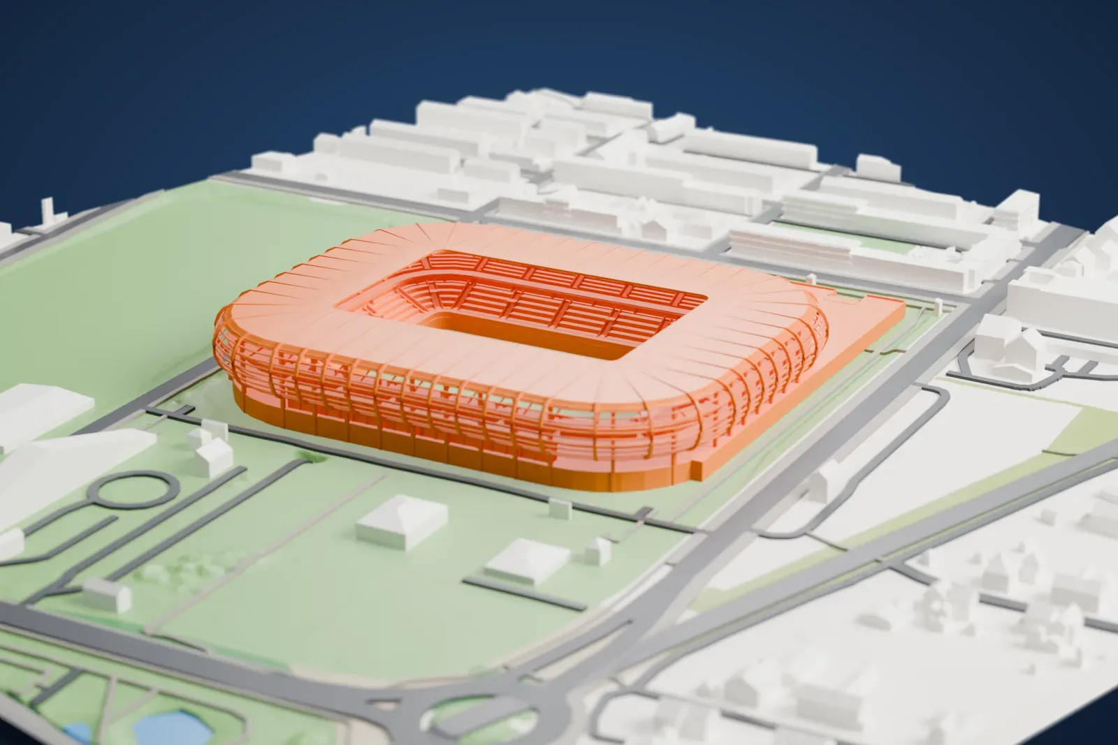 A white 3D print of Arena Zabrze, a rounded football ground with a curved screen facade, among the surrounding streets and buildings.