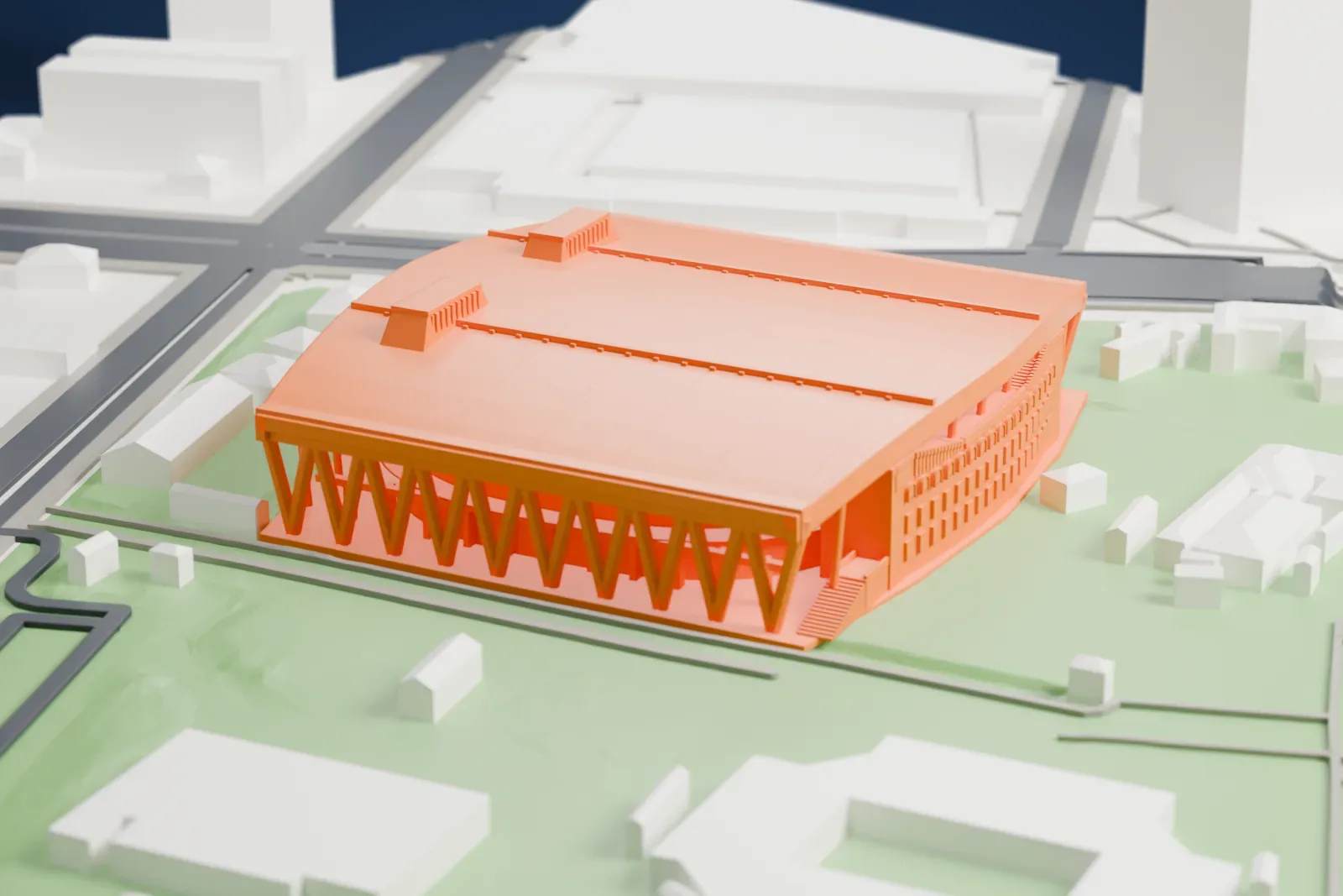 A white 3D print of Ariake Coliseum with its broad roof and the surrounding park and city buildings.