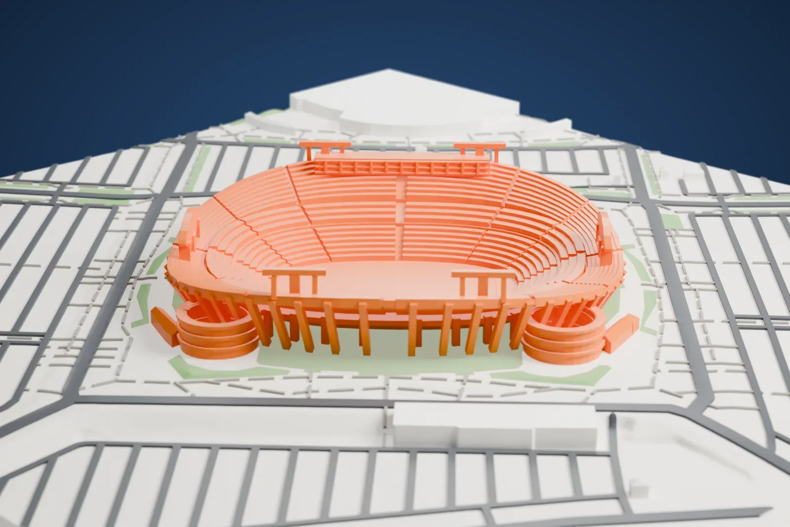 A white 3D print of Arrowhead Stadium, a large oval bowl with steep seating tiers and slanted support struts, surrounded by parking areas and roads.