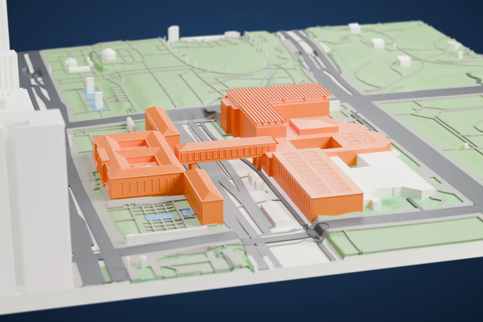 A white 3D print of the Art Institute of Chicago, a large museum building, among the surrounding streets and buildings.