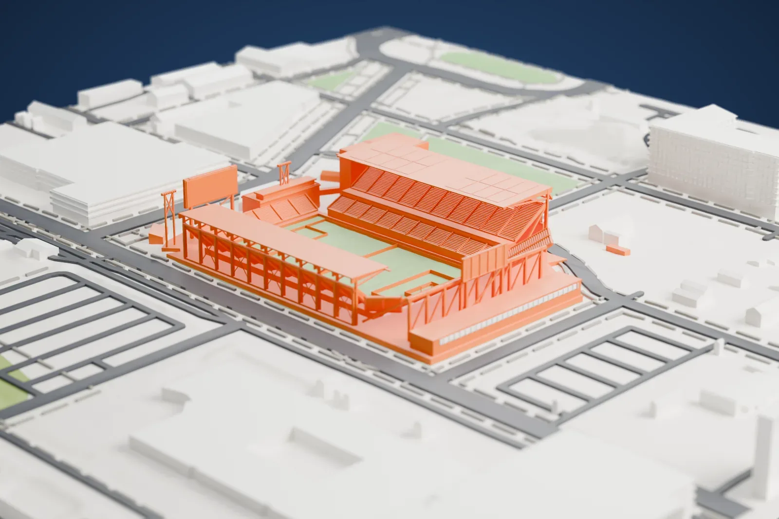 A white 3D print of Audi Field, a compact soccer stadium with braced stands and roofs around a pitch, surrounded by wide roads, open lots and a few large buildings.