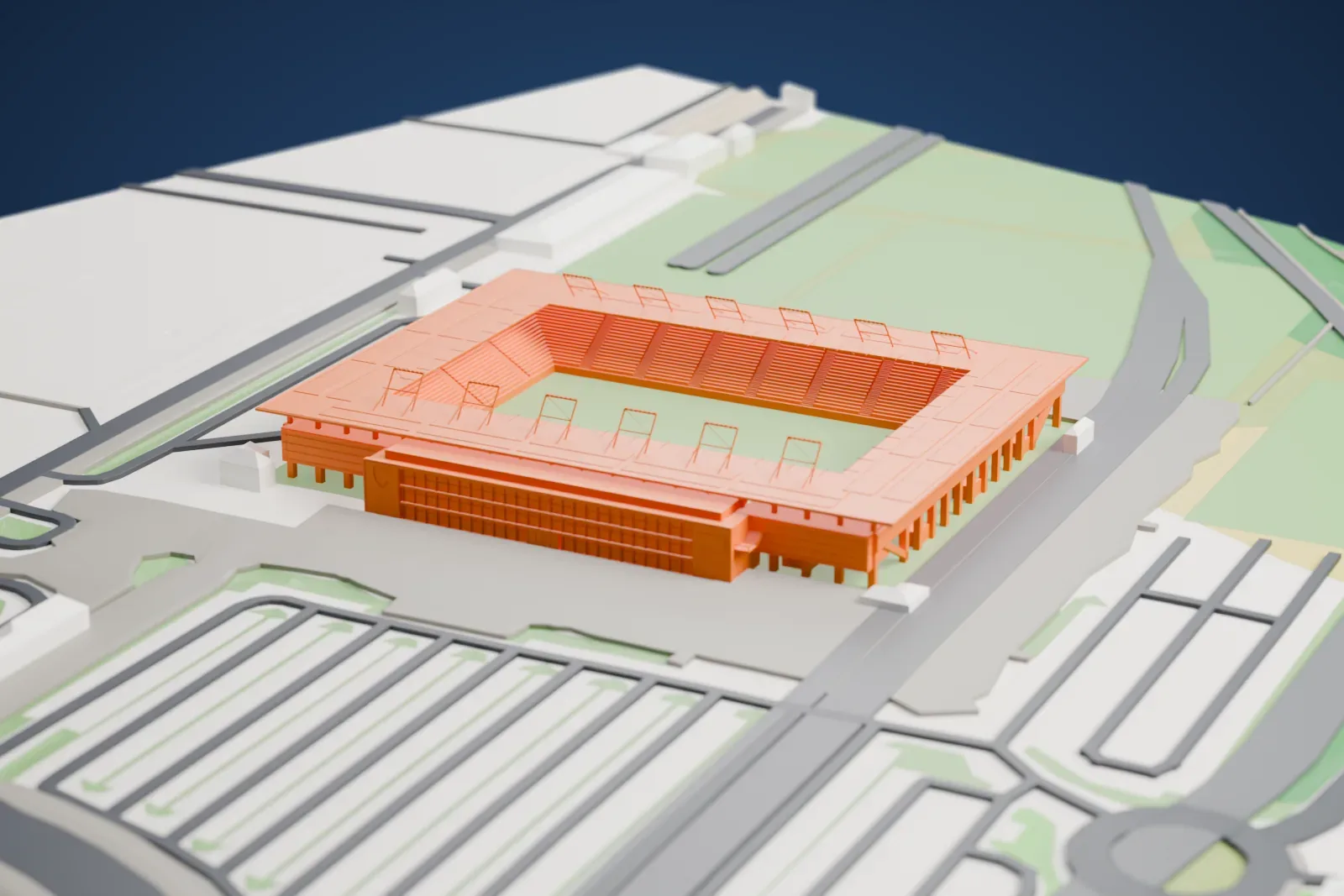 A white 3D print of Audi Sportpark, a rectangular stadium with open floodlight frames and a projecting glass entrance, among the streets and buildings of Ingolstadt.