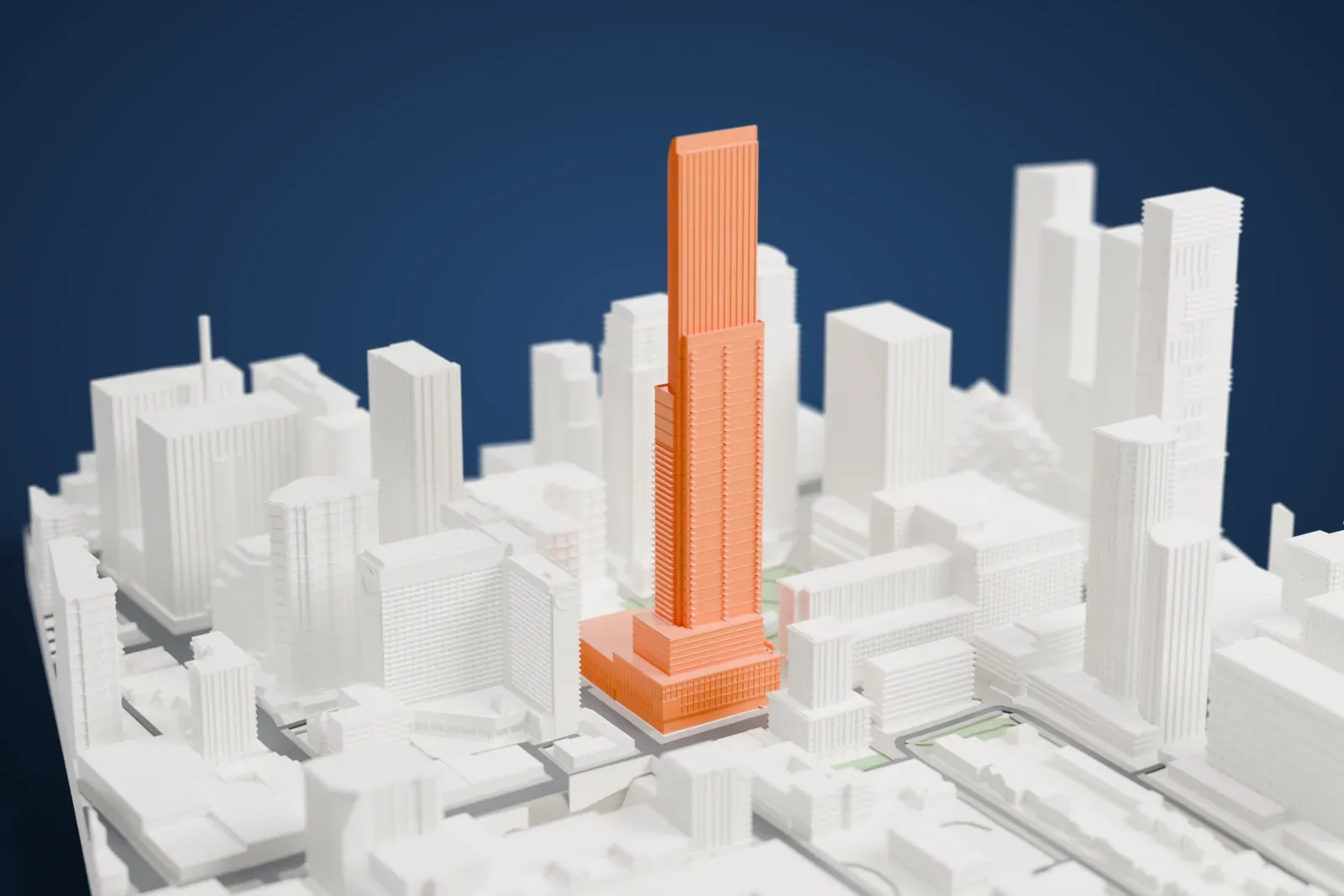 A white 3D print of Aura, a tall skyscraper, surrounded by streets and buildings.