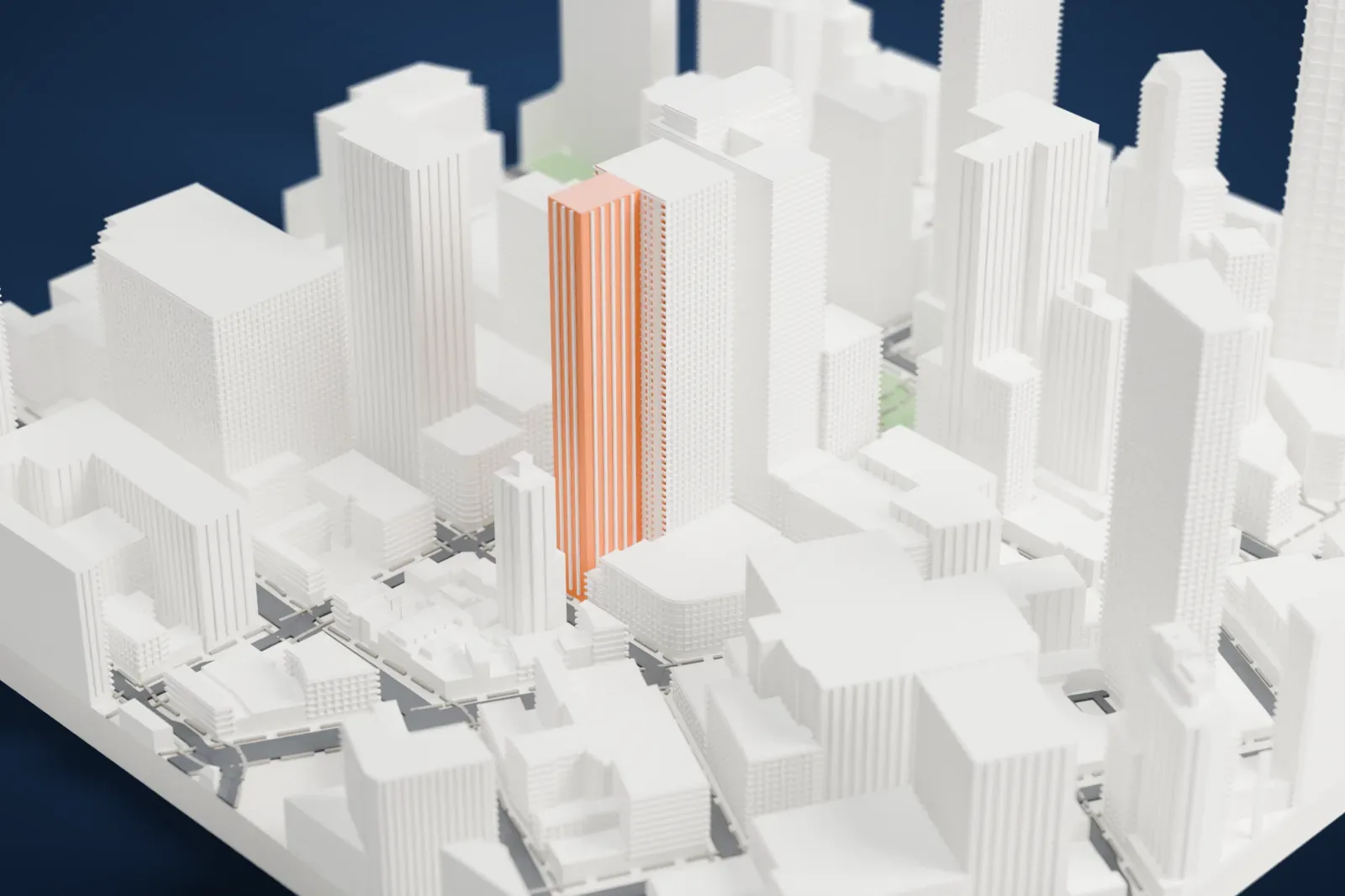 A white 3D print of AVA DoBro, a tall rectangular tower, standing among other high-rises with small green patches and streets at its base.
