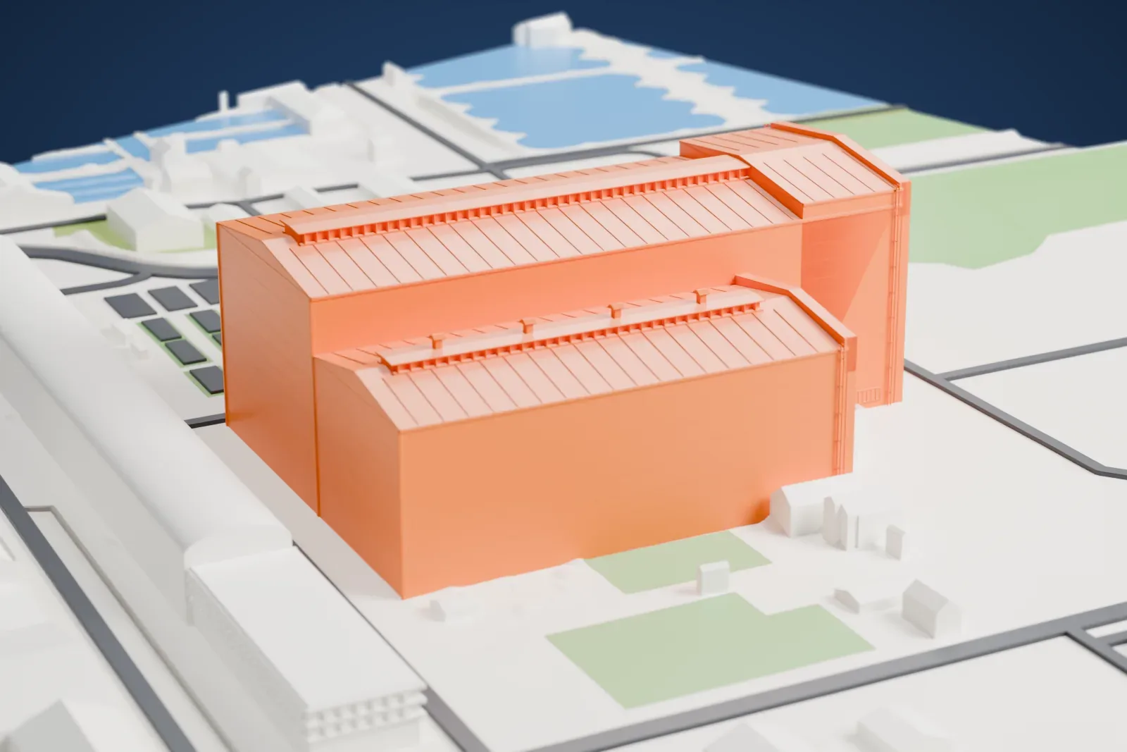 A white 3D print of B&W Hallerne, two large gabled halls side by side with ridge monitors on the roofs, among the surrounding streets and buildings.