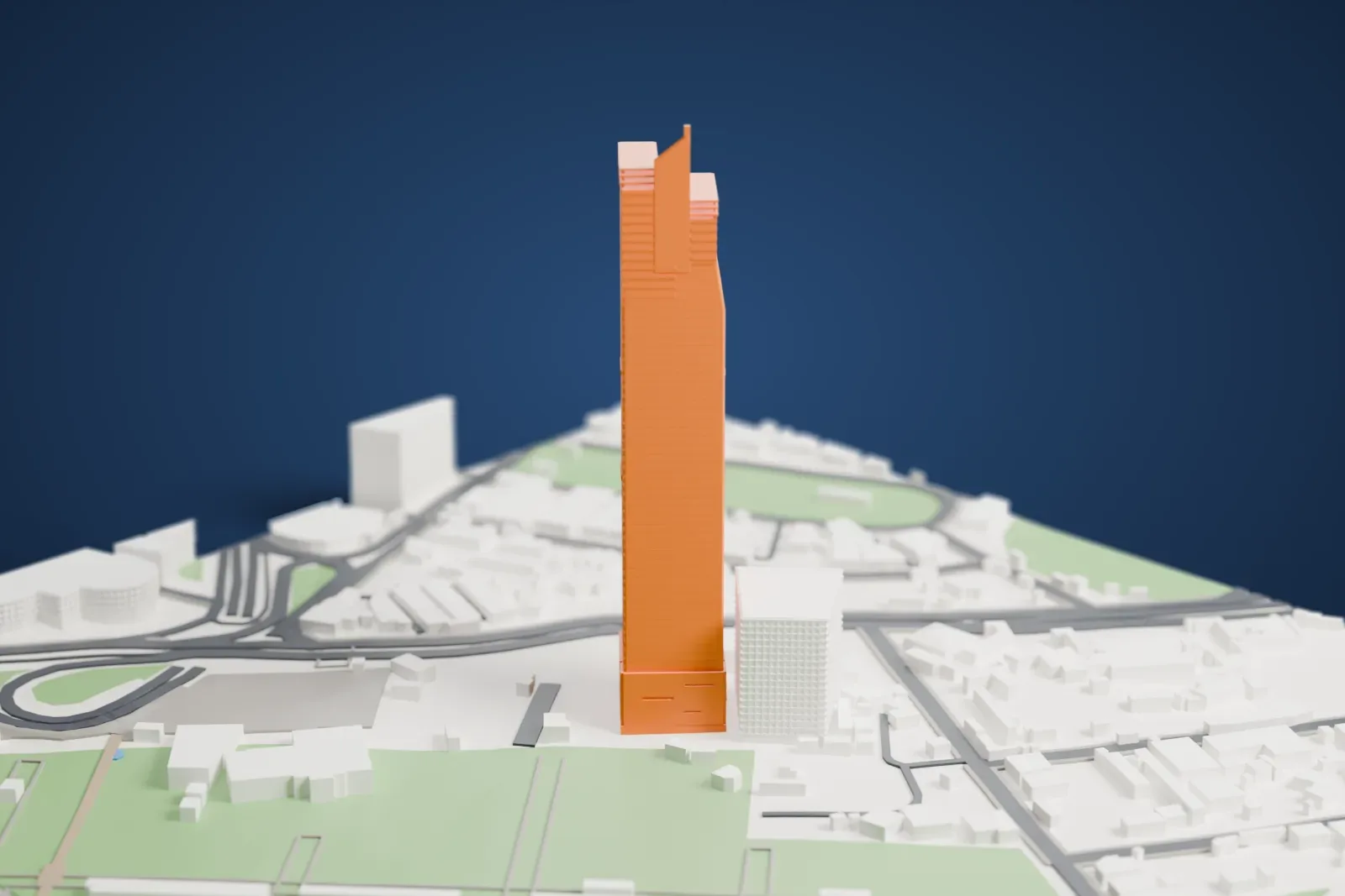 A white 3D print of the Bahria Icon Tower, a tall glass tower with a sloping concrete crown and a short tip, standing among neighboring buildings beside a green park.